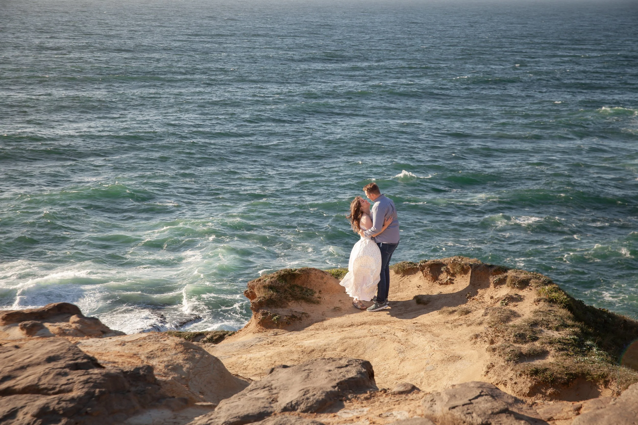 Romantic engagement portraits on the Oregon Coast. Pacific City. 