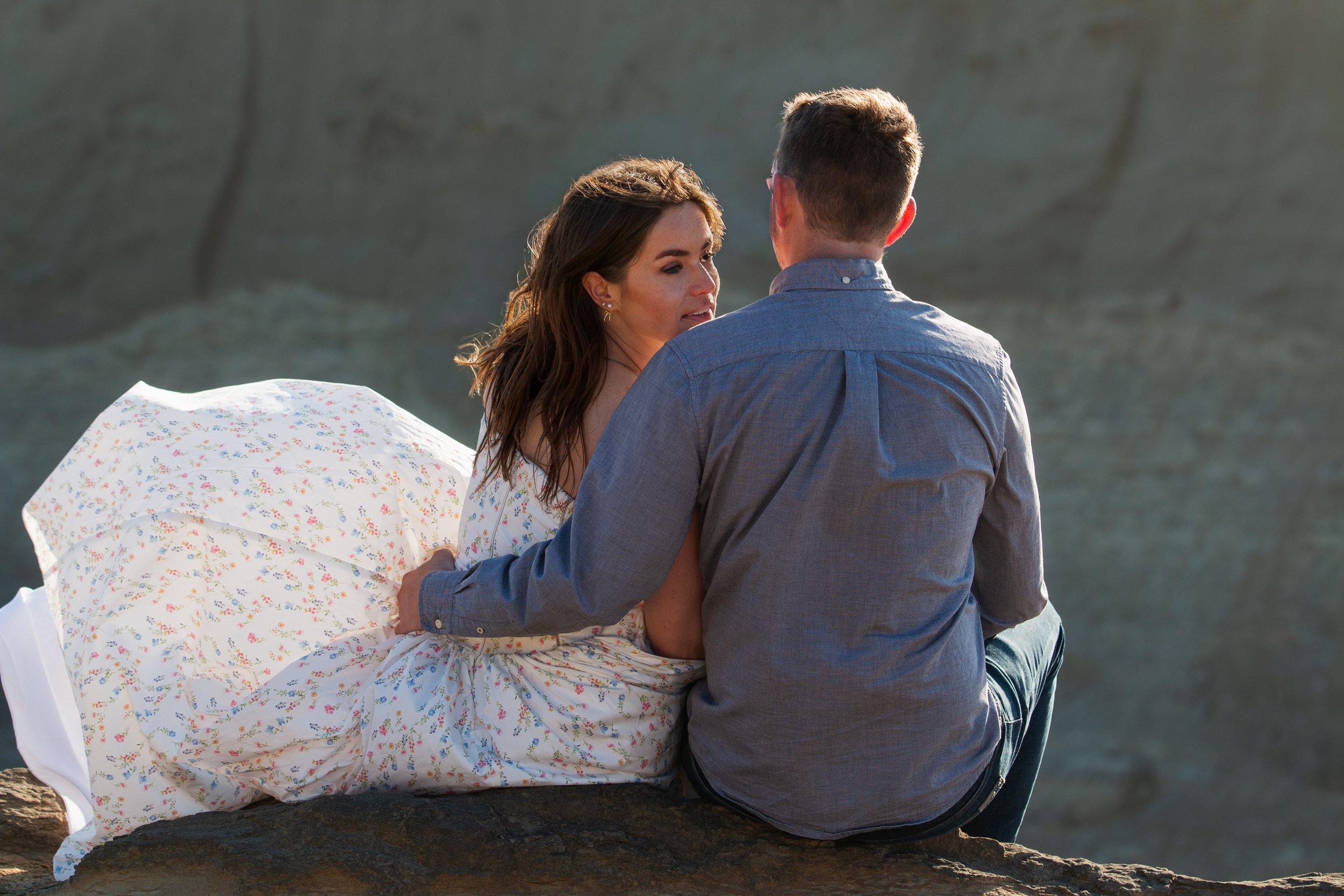 Candid engagement photography celebrating the moments between poses. Pacific City. Oregon Coast. 