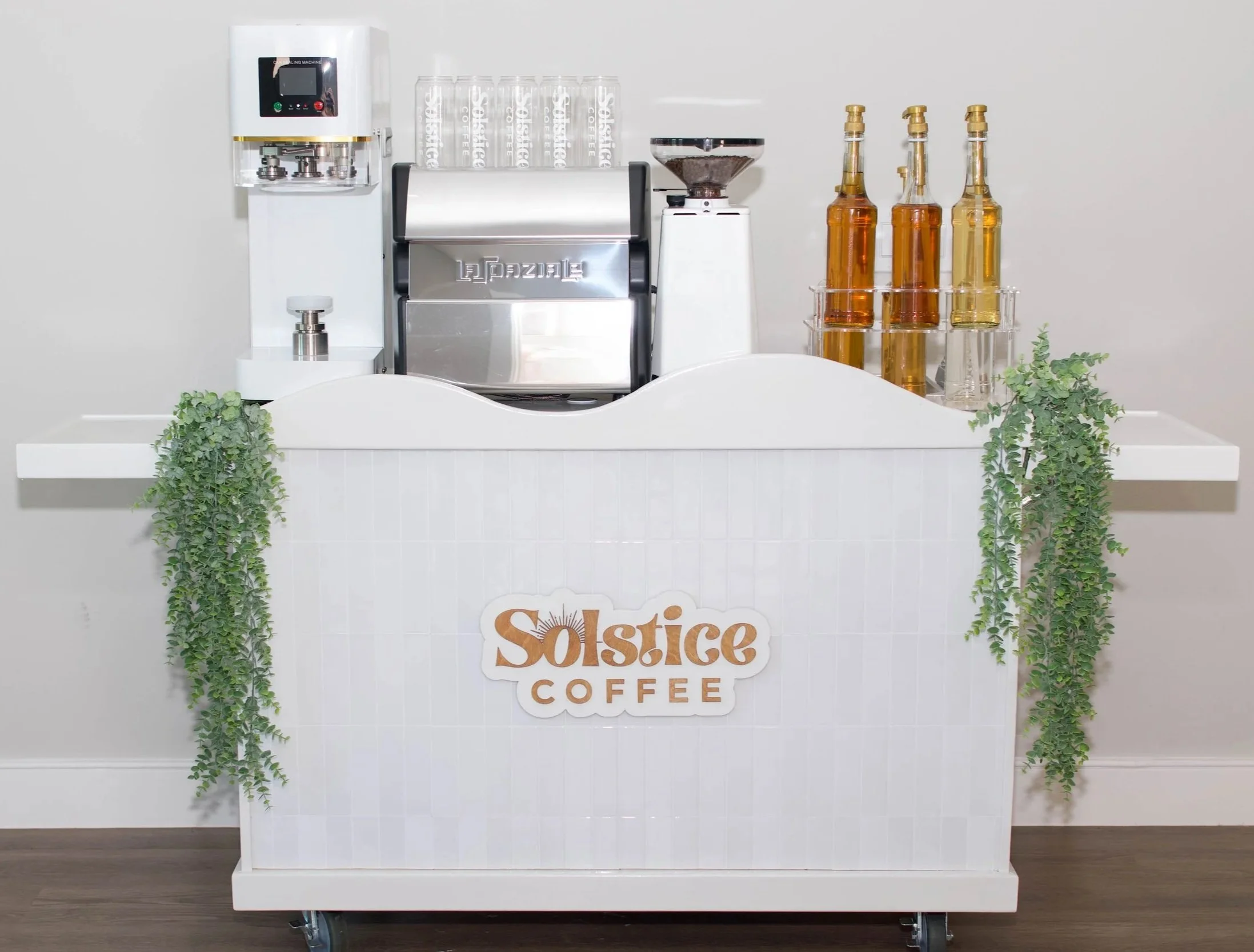 White coffee cart available for public and private events serving espresso in Austin, texas.