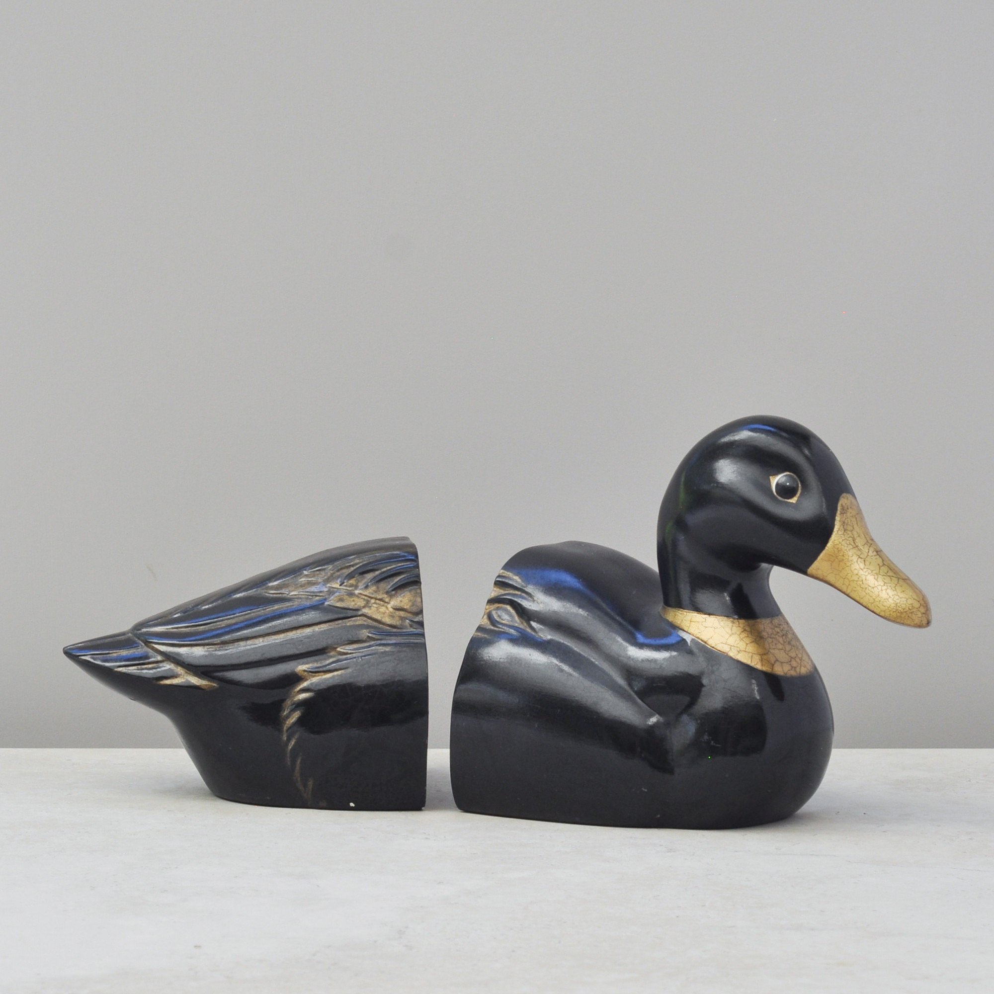 Angled view of handmade studio pottery duck bookend