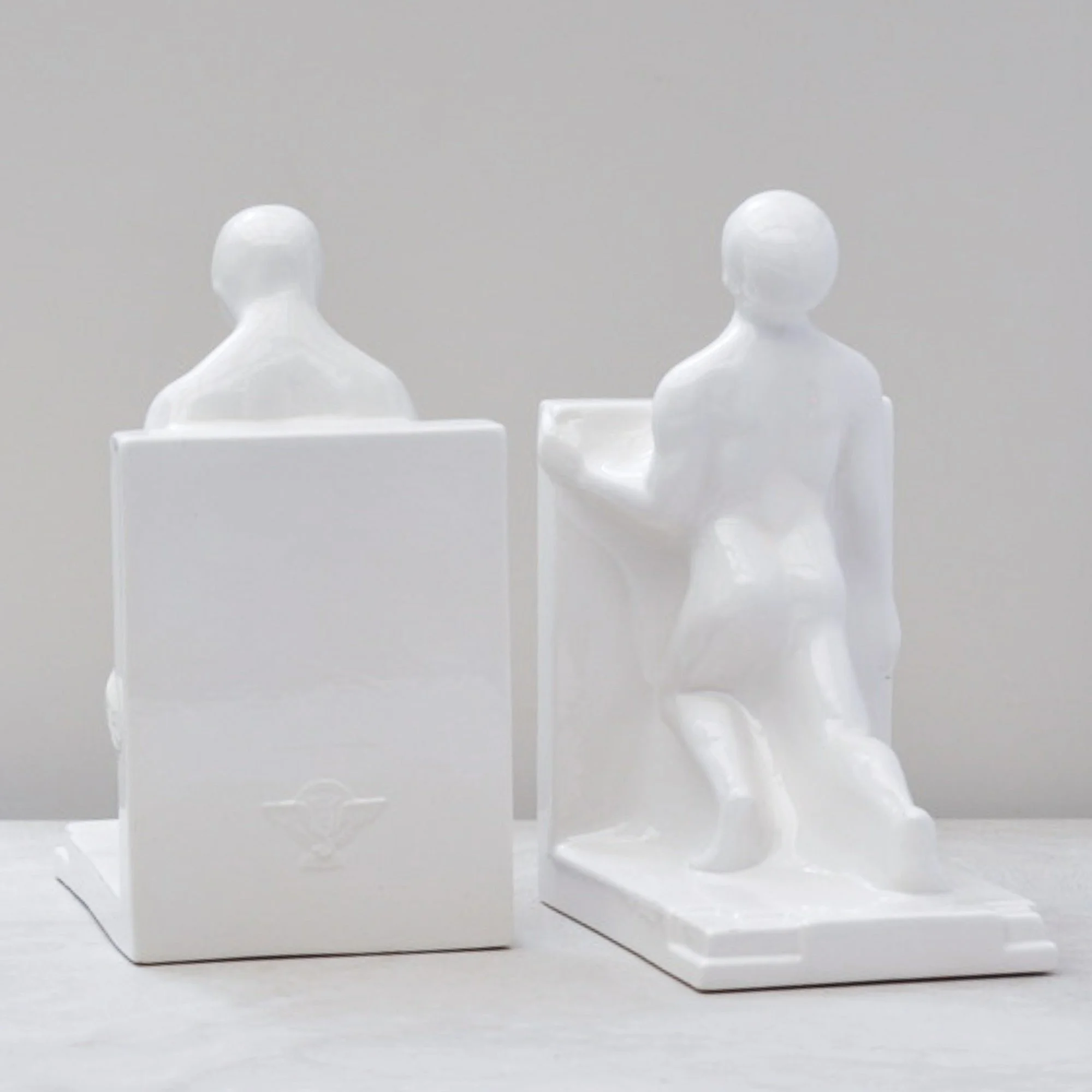 Rear view of Art Deco nude male bookends in white ceramic, Schoonhoven pottery, Netherlands