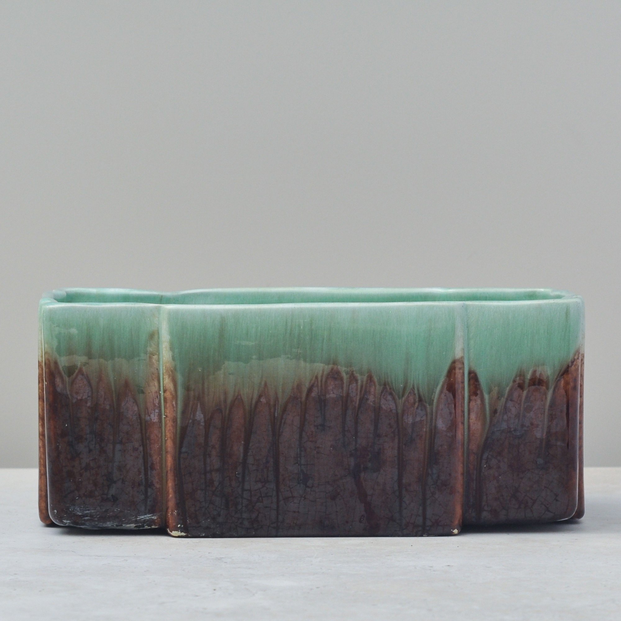 Profile view of Australian mid-century Trent Art Ware drip glaze planter