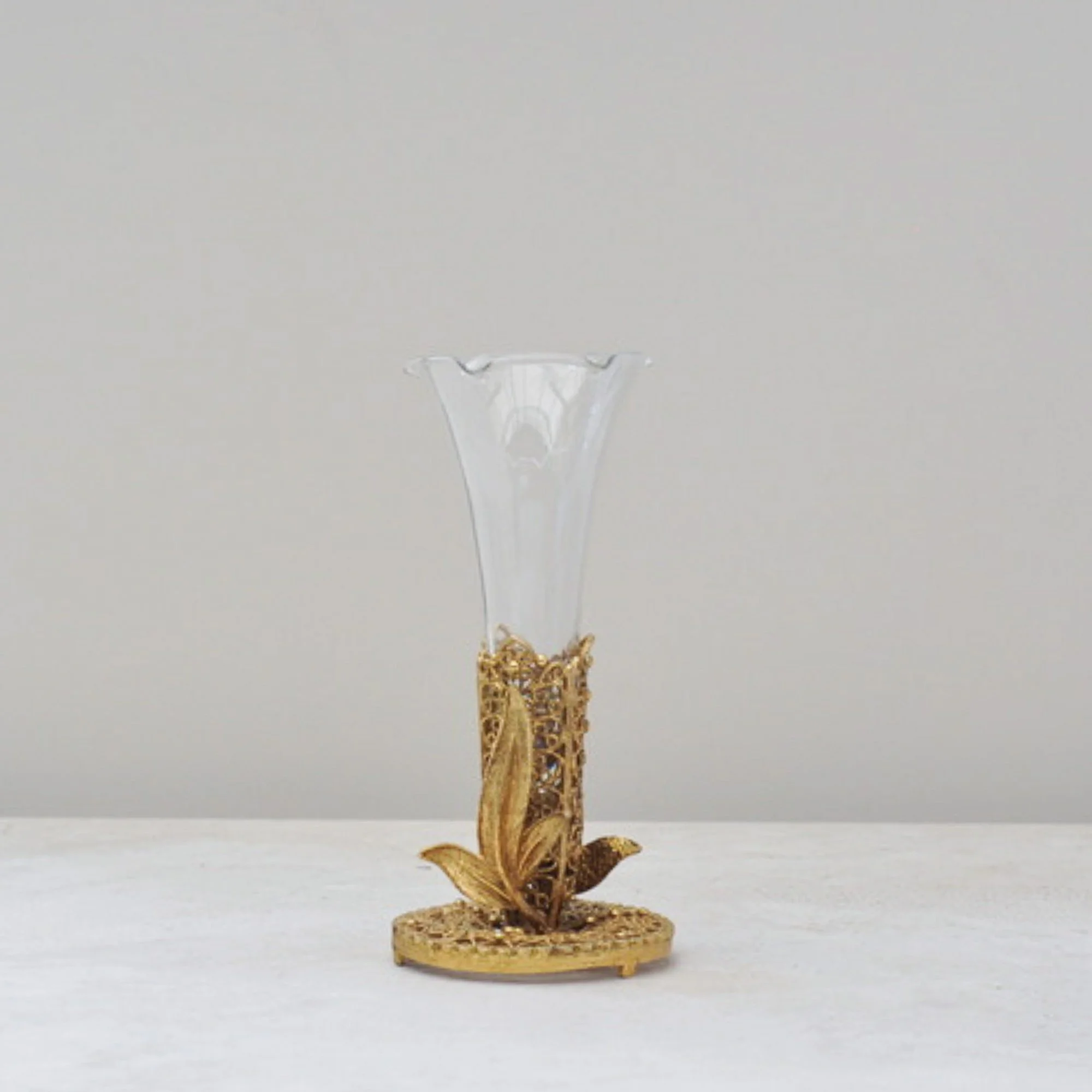 Mid-century filigree bud vase with ruffled glass insert