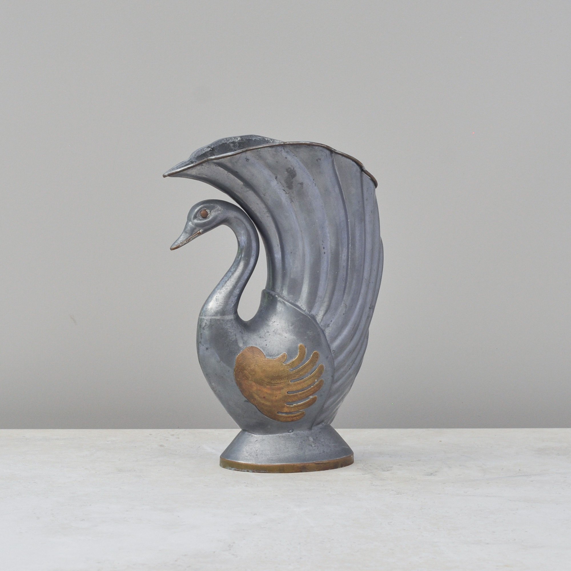 Mid-century pewter swan vase with brass detail front view