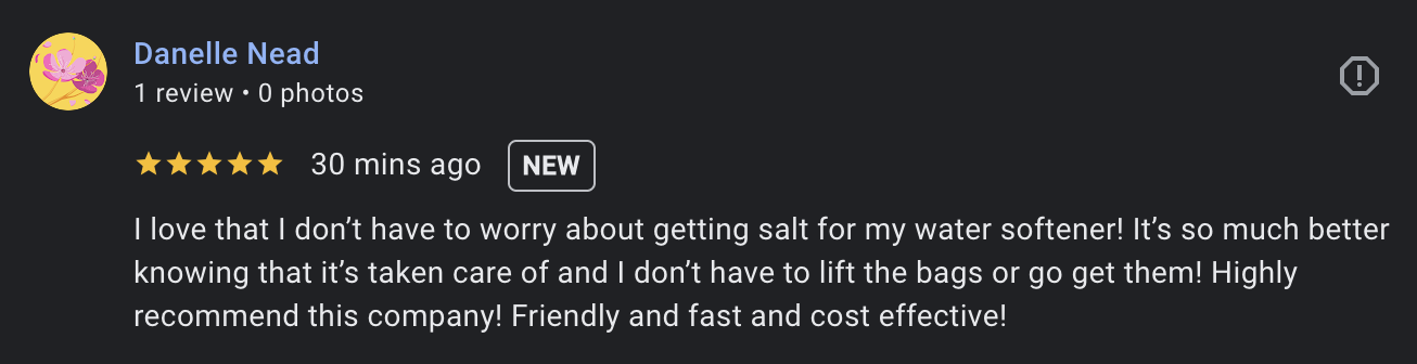 Screenshot of a customer review for a water softener company, praising the ease of salt management and cost effectiveness.