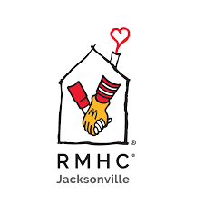 Illustration of two hands shaking inside a house outline with a heart above, representing community or partnership. Text reads 'RMHC Jacksonville'.