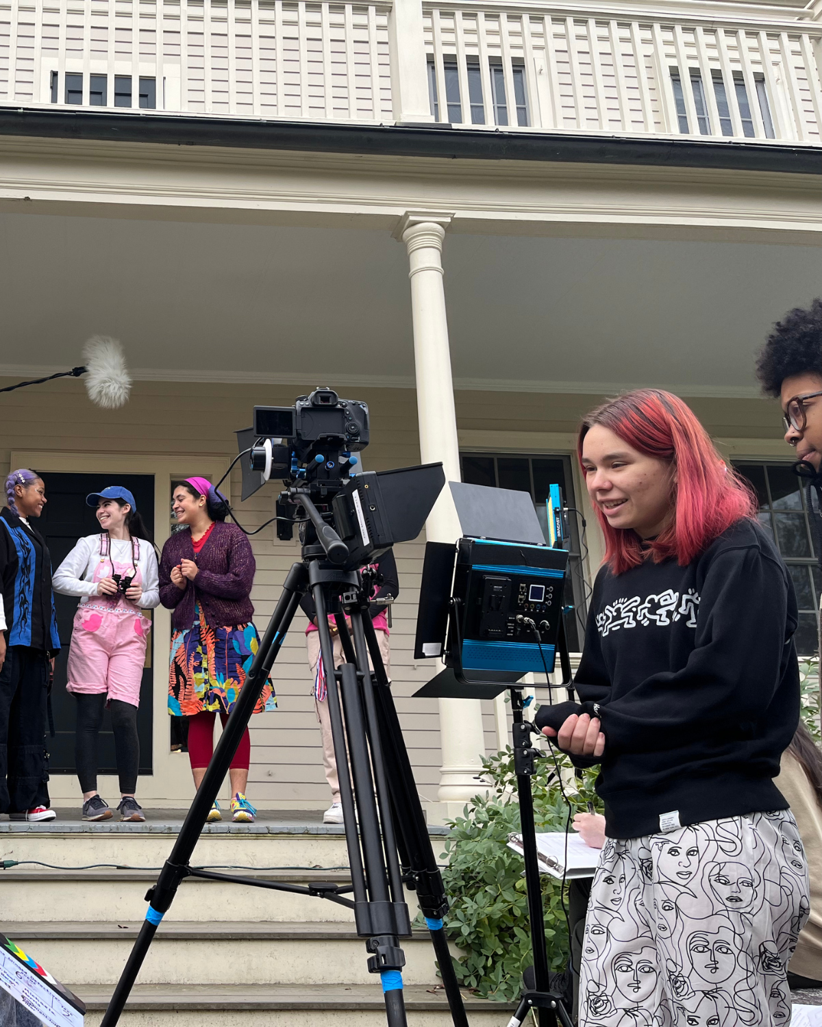 Filmmaker Paola Michaela directing the cinematography on the set of the winged detectives  