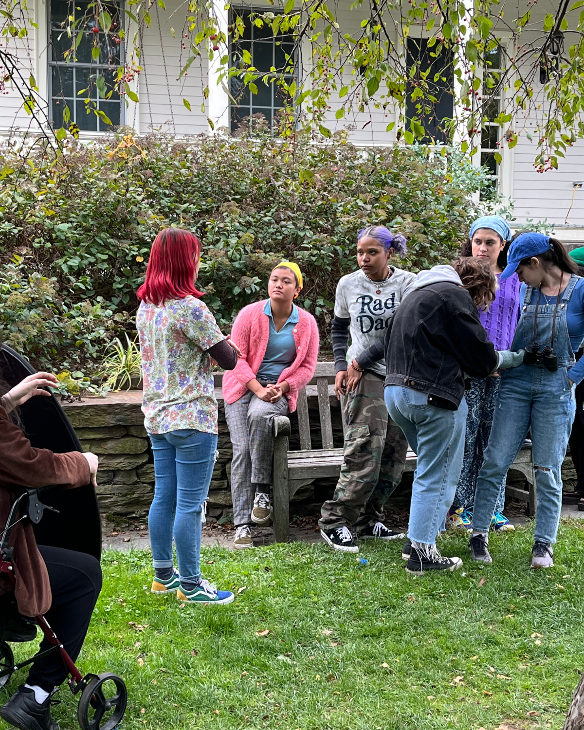 Filmmaker Paola Michaela directing actors on the set of the winged detectives