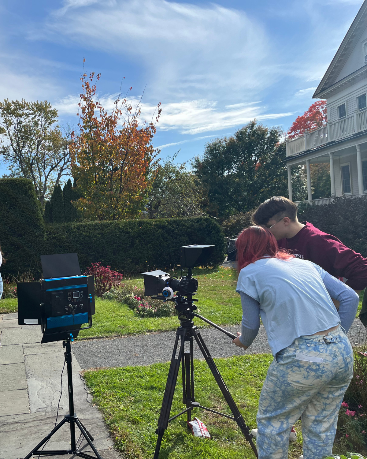 THE WINGED DETECTIVES (2022) Director Paola Michaela and 1st AC Tarryn Gaherty setting up for outdoor shot