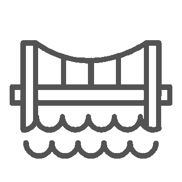 A skydiver in free fall with a parachute deployed above the clouds.