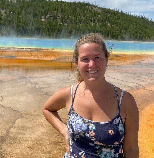 woman-smiling-grand-prismatic-ground-level.jpg