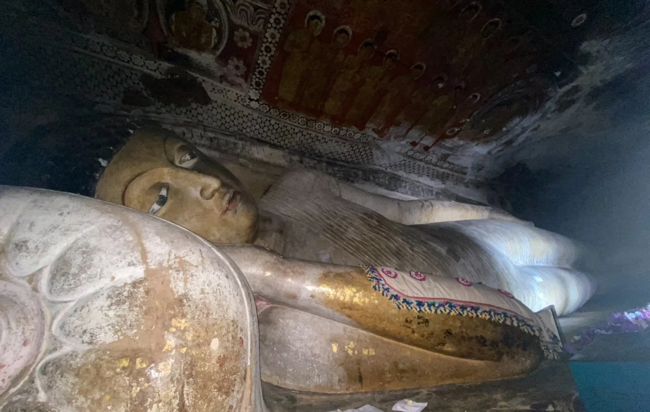 Large Buddha statue inside the Dambulla Royal Cave Temple in Sri Lanka.