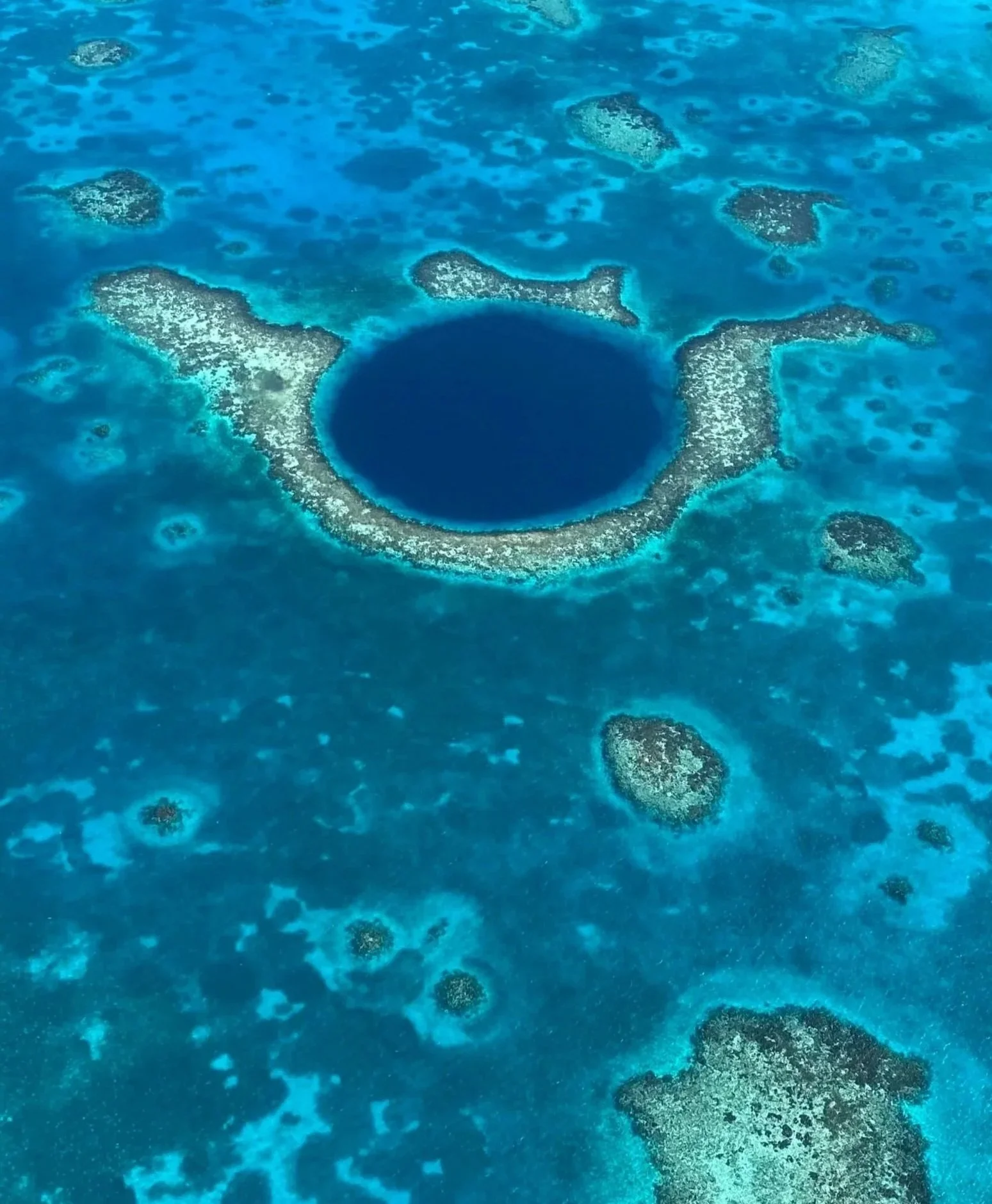 Belize Blue Hole from airplane flight sightseeing