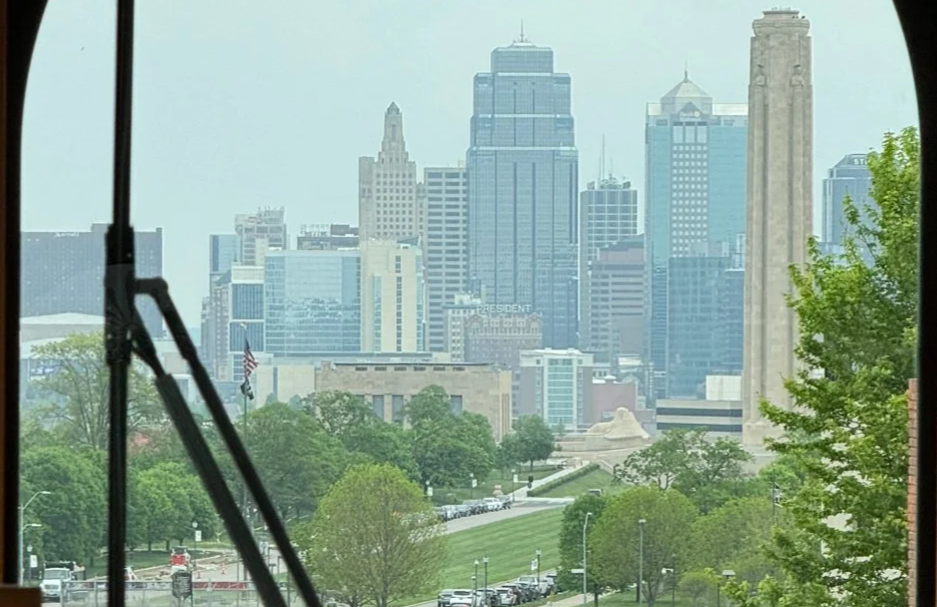 View of Kansas City seen through the front window of a trolley.