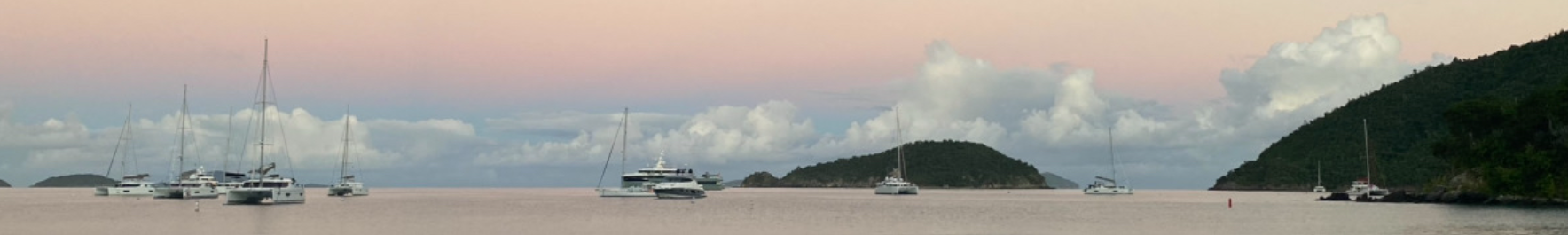 sunrise ocean clouds boats water