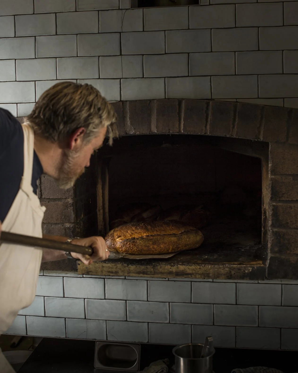 4. Mike turning the bread.jpg