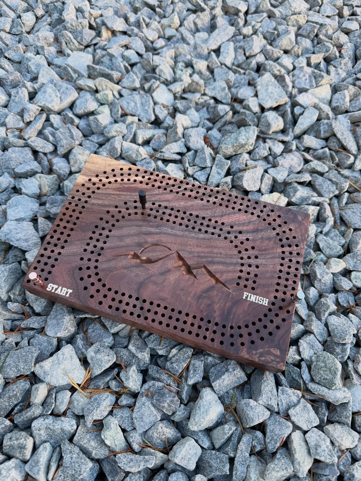 Looking for a truly unique Christmas gift? This beautiful cribbage board, crafted from a walnut burl slice, boasts vibrant colors that dance in the sunlight.

Make someone's holiday season special with this one-of-a-kind piece.

#mattywestsidewoodwor