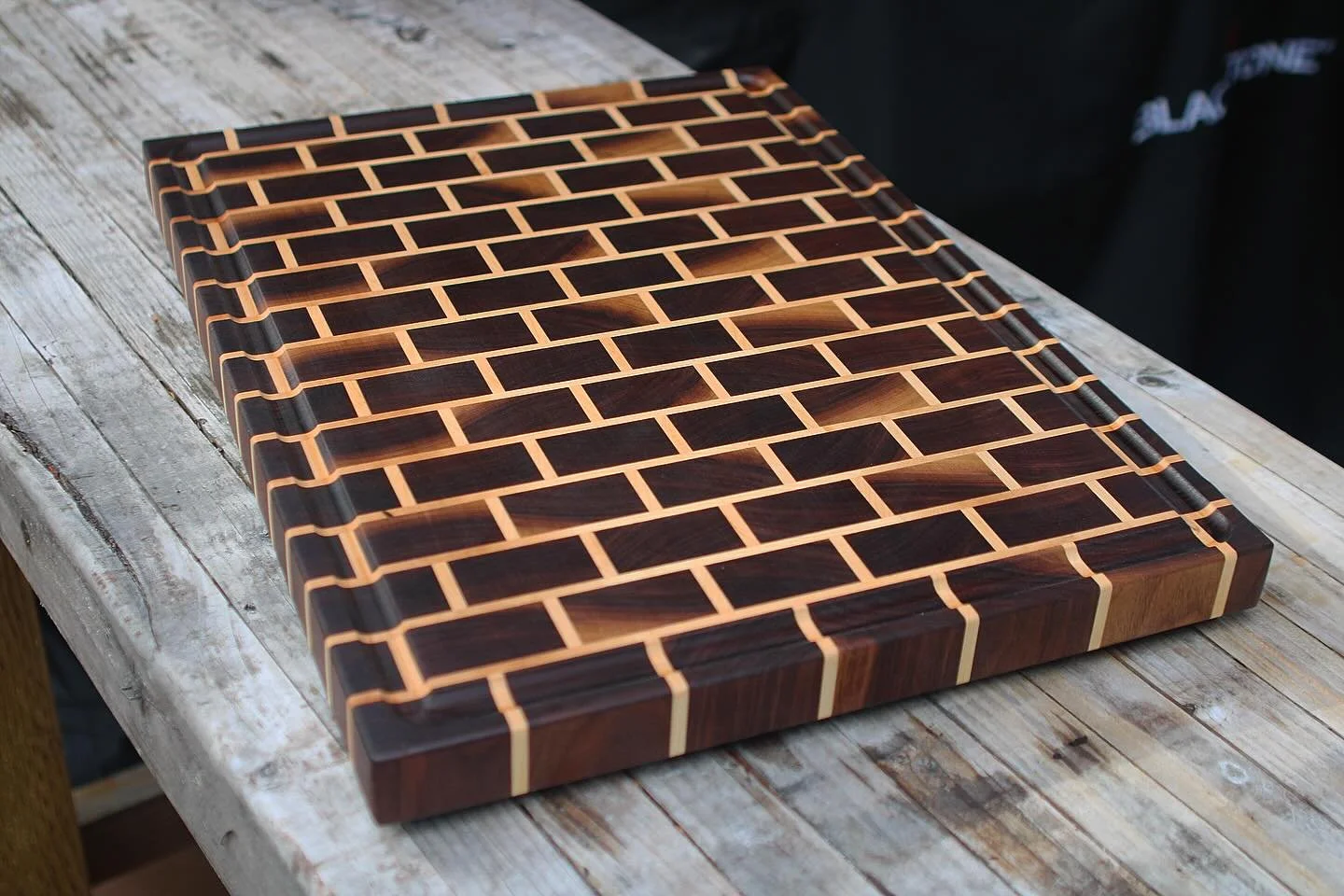 Newest project just completed. The bricks are Walnut and the mortar is Maple. Beautiful new cutting board. 

#woodworking #cuttingboard #mapletree #walnuttree