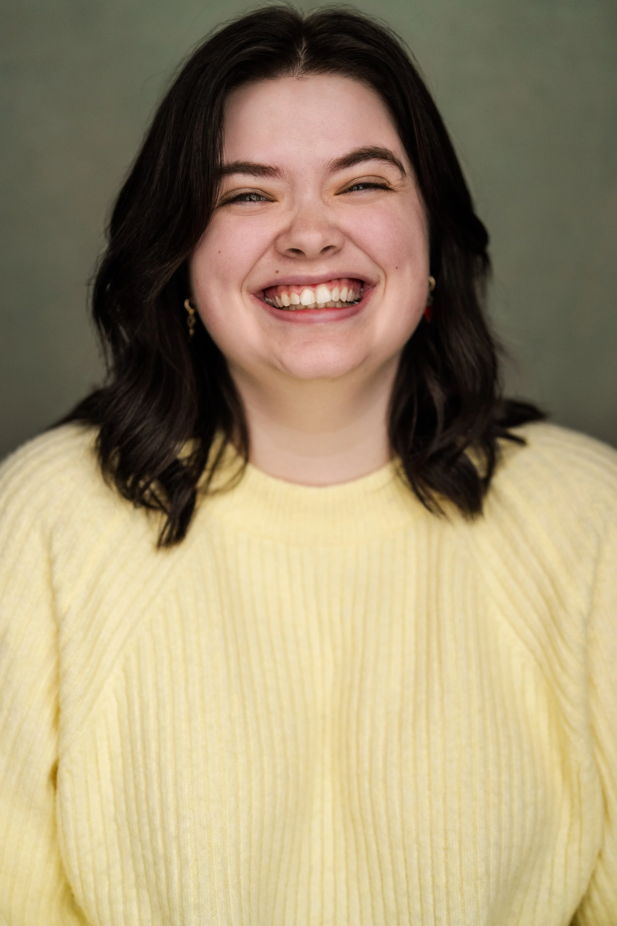 Sarah Birkmeyer Headshot Yellow Smile Full.JPG