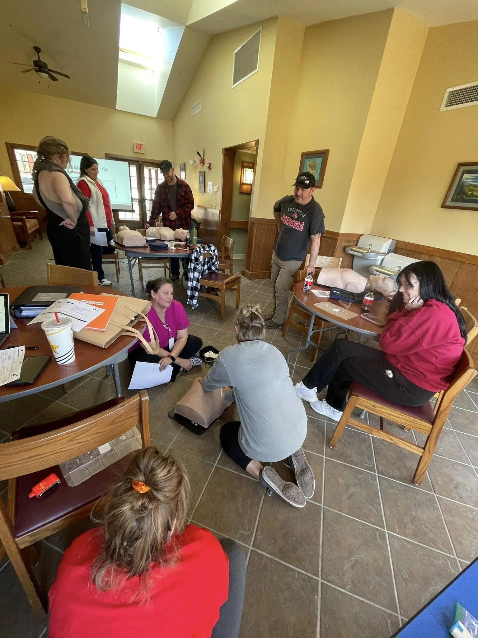Hands-on learning: Participants practiced lifesaving techniques including CPR and Stop the Bleed during the weekend certification training.