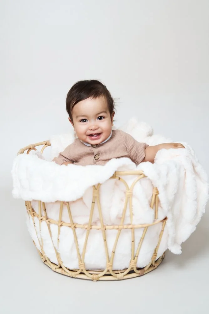 Light-filled childcare portrait in Sydney capturing a genuine smile and playful expression.