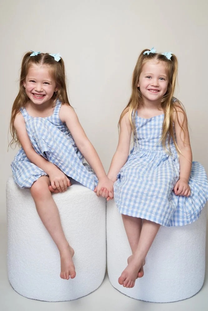 Light-filled childcare portrait in Sydney capturing a genuine smile and playful expression.