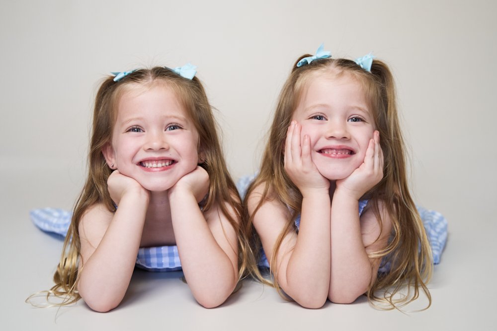 Light-filled childcare portrait in Sydney capturing a genuine smile and playful expression.