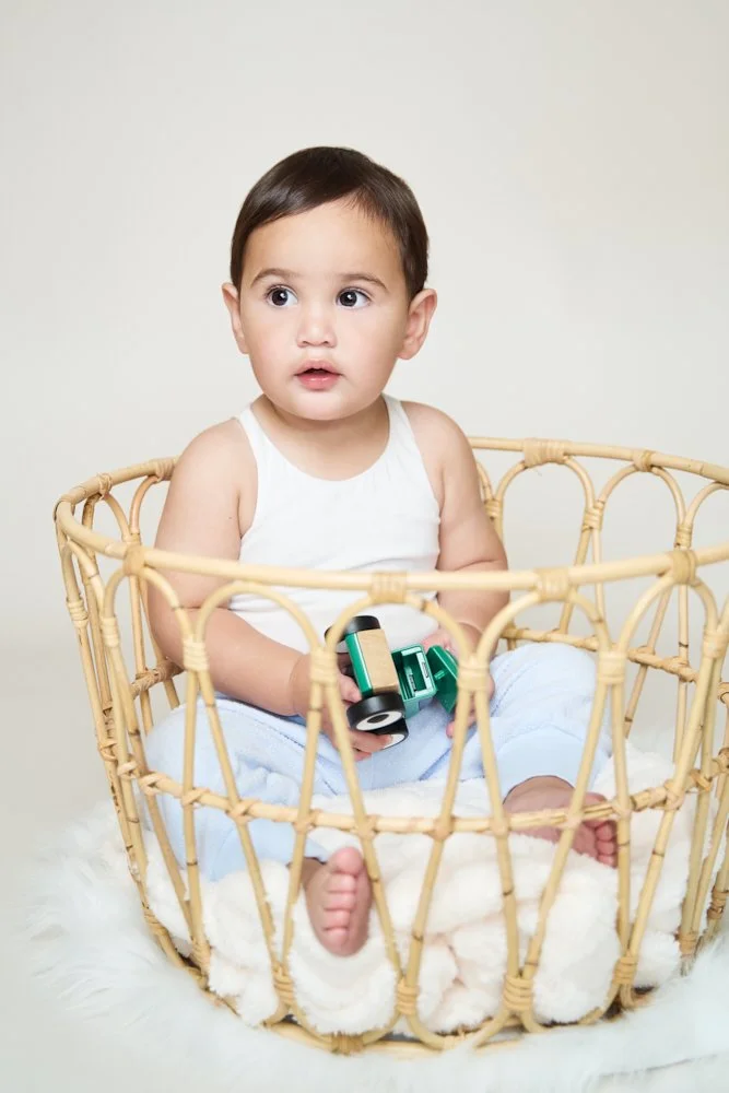 Light-filled childcare portrait in Sydney capturing a genuine smile and playful expression.