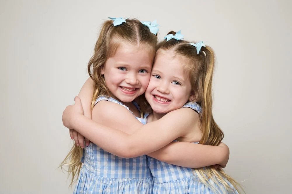 Light-filled childcare portrait in Sydney capturing a genuine smile and playful expression.