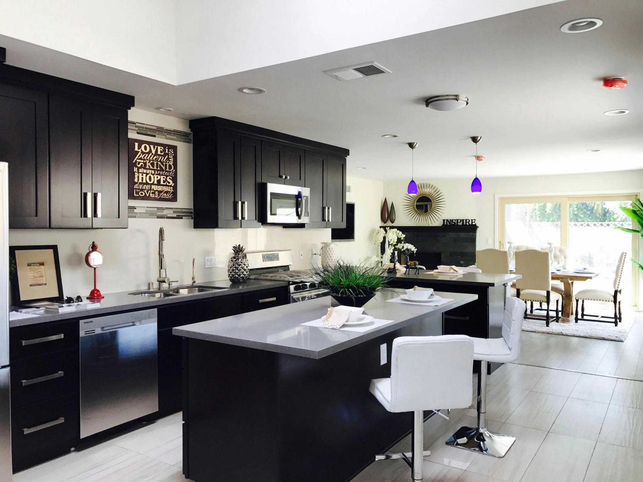 a beautiful contemporary kitchen staged as part of a showing while the home is for sale