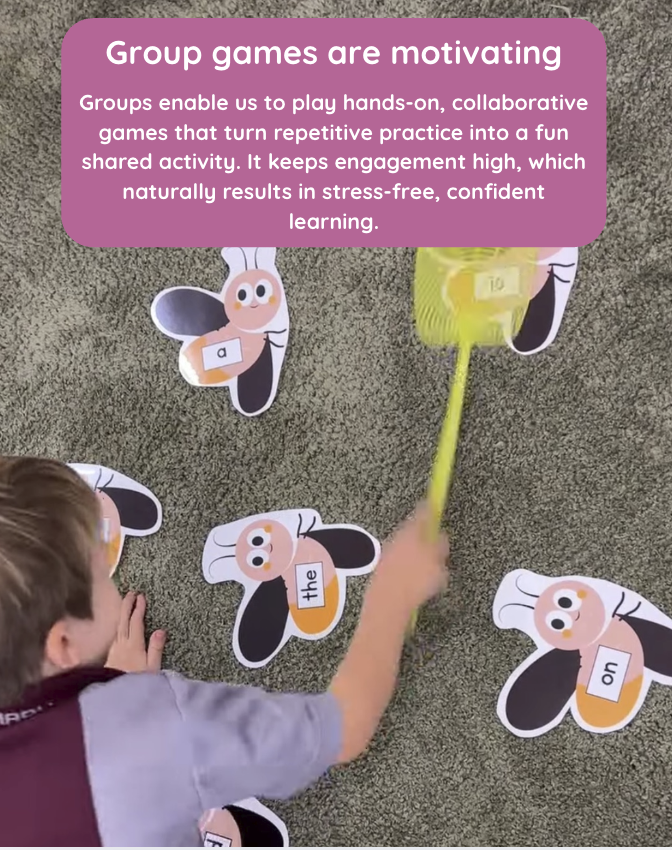 Child playing a word swatting game on the floor, with the caption "Group games are motivating"