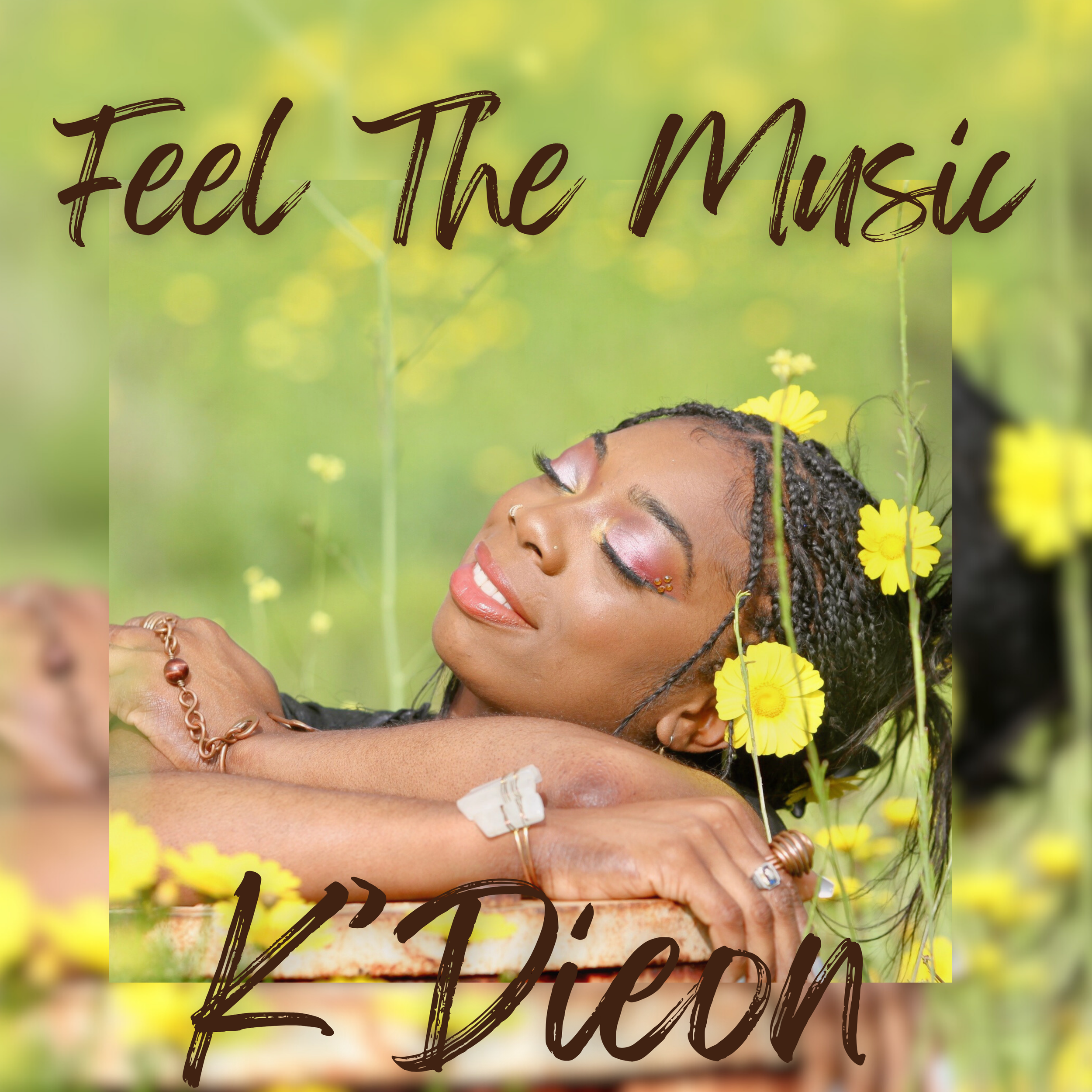 A woman relaxing with eyes closed, surrounded by yellow flowers and greenery, with text overlaid that says 'Feel The Music K'Deon'.