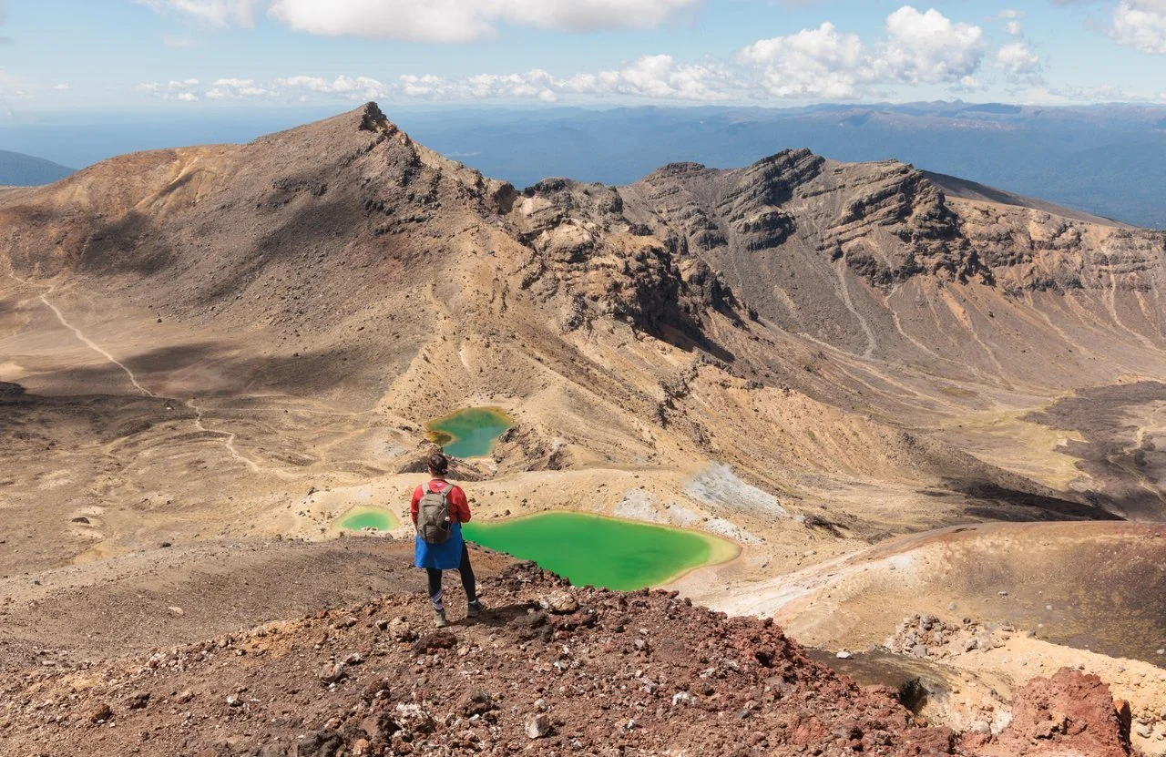 Tongariro Alpine Crossing - Tongariro National Park - girl looking at Emerald Lakes-medium.jpg