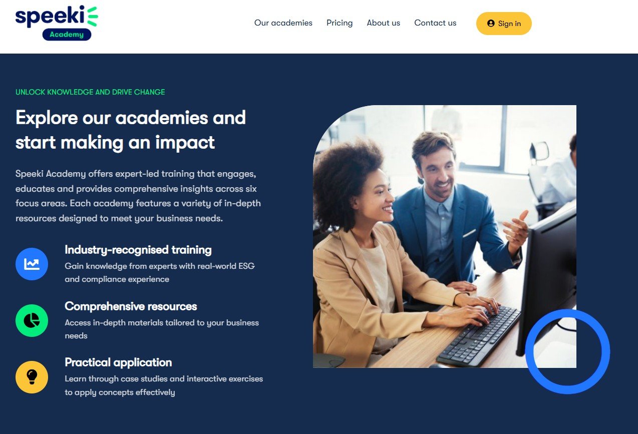 Screenshot of Speeki Academy website homepage with a header, navigation menu, sign-in button, and a section describing their academies and training programs. The section includes text and an image of two professionals working at a computer, engaging in a discussion.