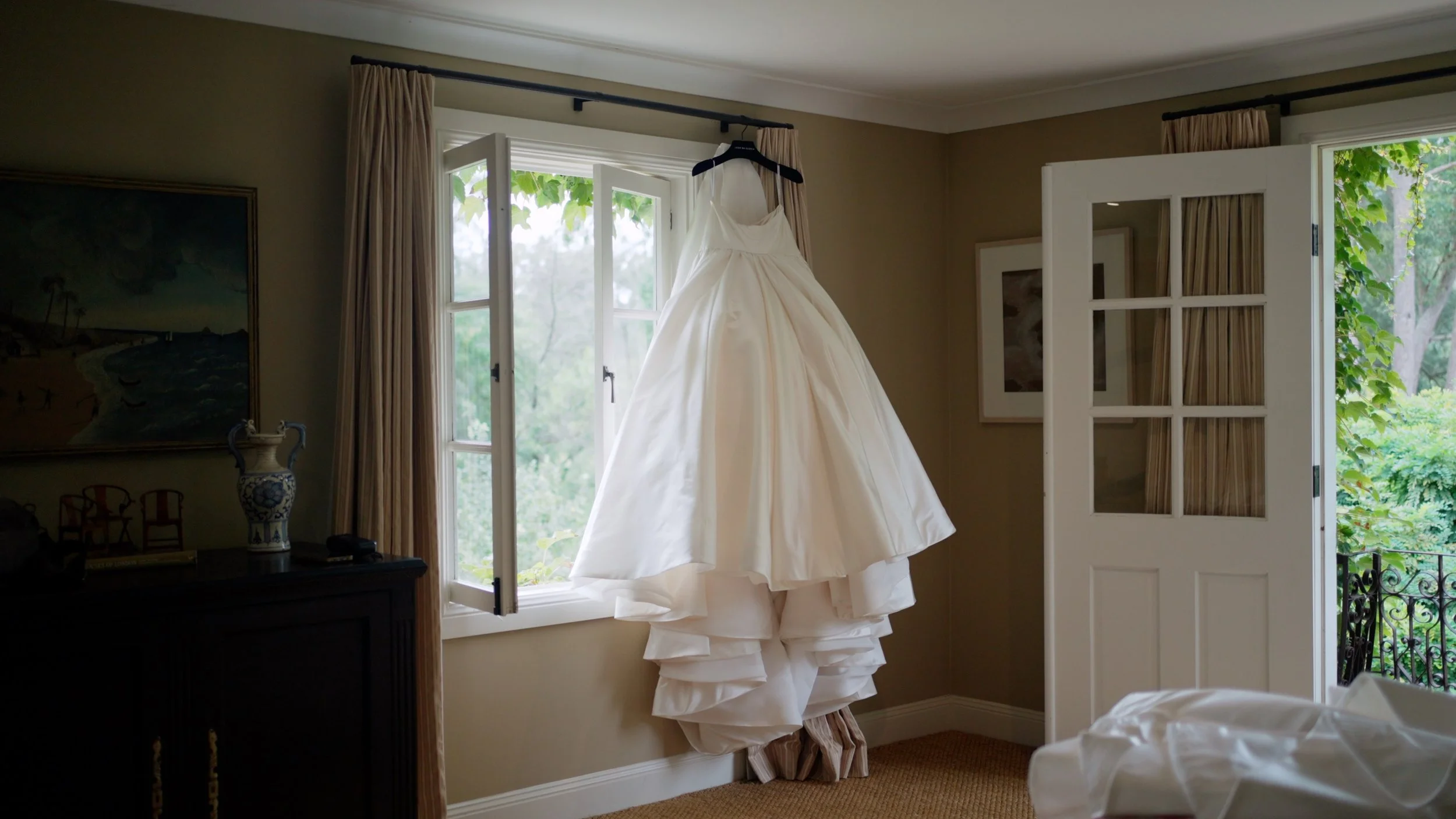 Framegrab_Michelle_Jake_hanging_dress.jpg