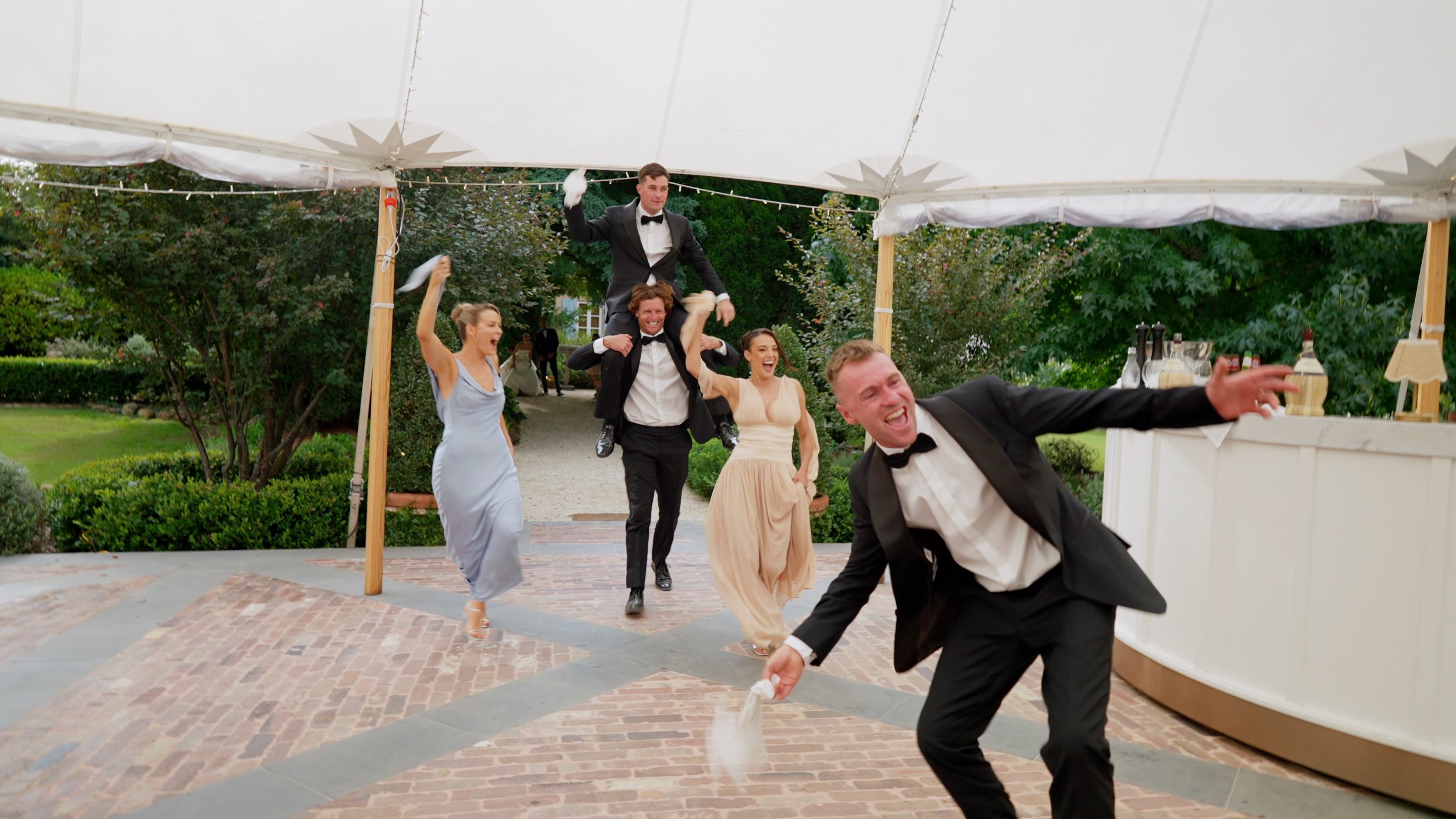 Framegrab_Michelle_Jake_entrance_bridalparty.jpg