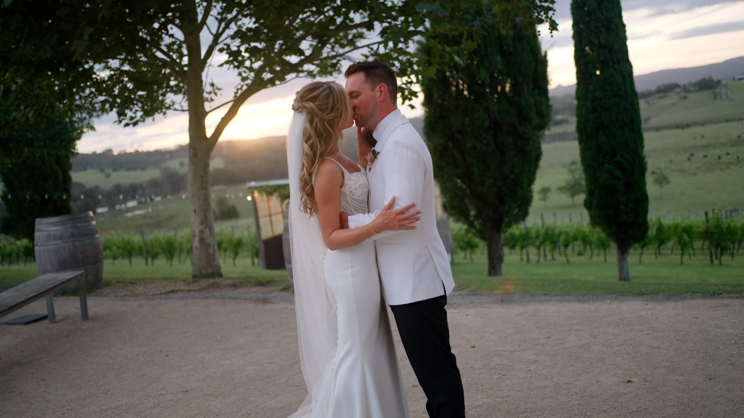 Frame_Erin_Michael_kiss_sunset.jpg