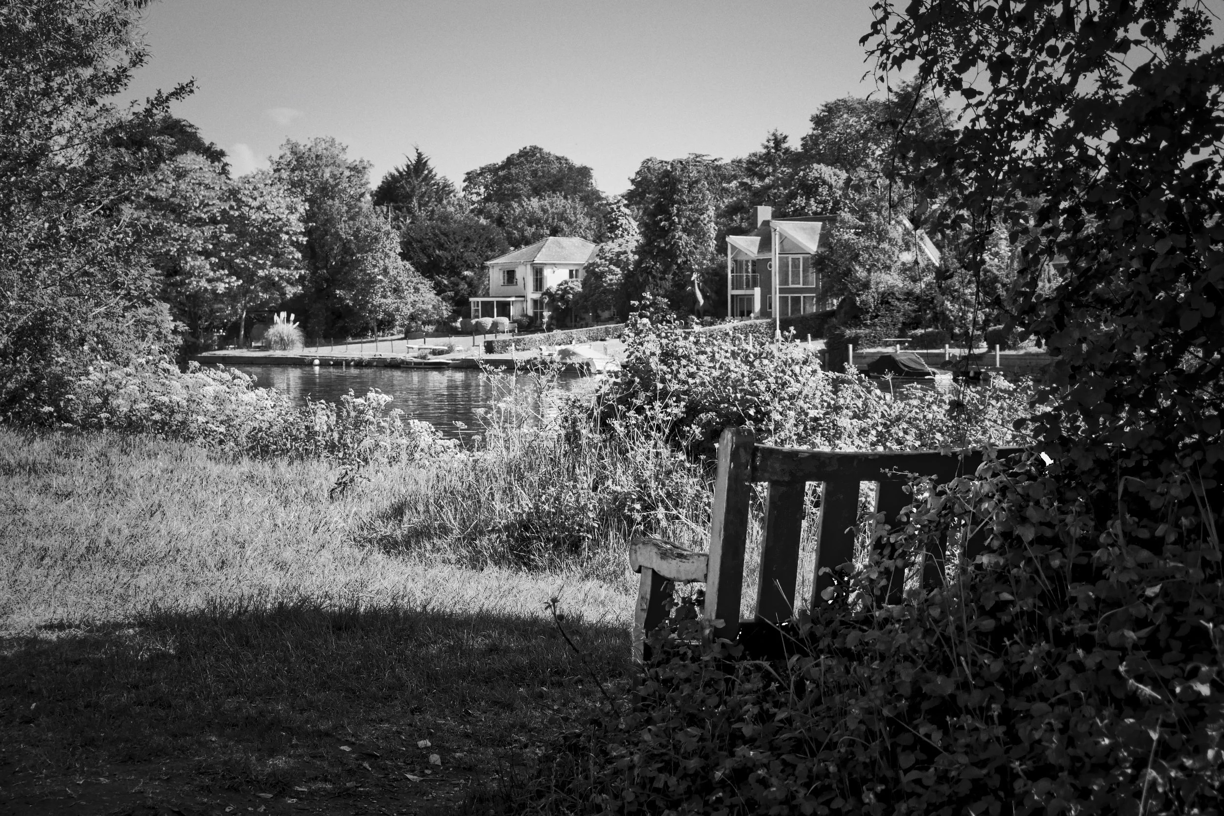 Seat by the river Thames at Bourne End, Buckinghamshire.jpeg