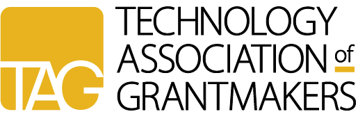 Close-up of a TAG Heuer watch with a black face and metal band.