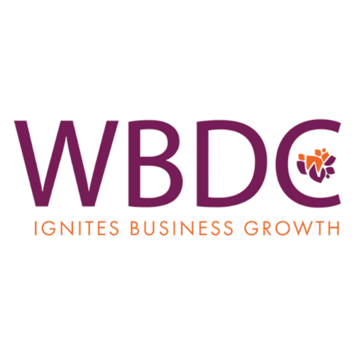 Logo for WBDC with purple text and orange slogan 'Ignites Business Growth' alongside a butterfly graphic