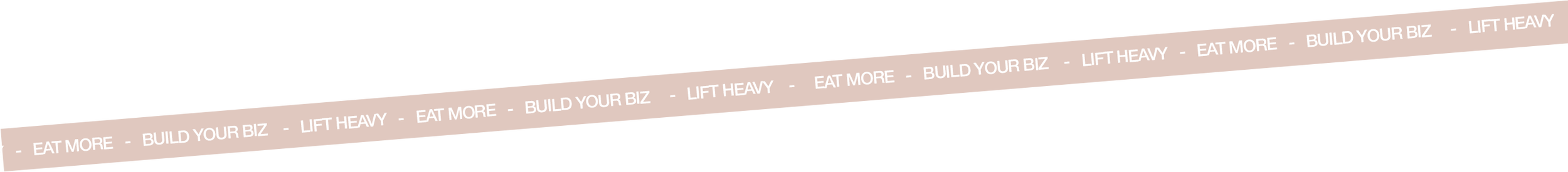 A pink ribbon with repeating white text that says 'EAT MORE - BUILD YOUR BIZ - LIFT HEAVY' on a pink background.