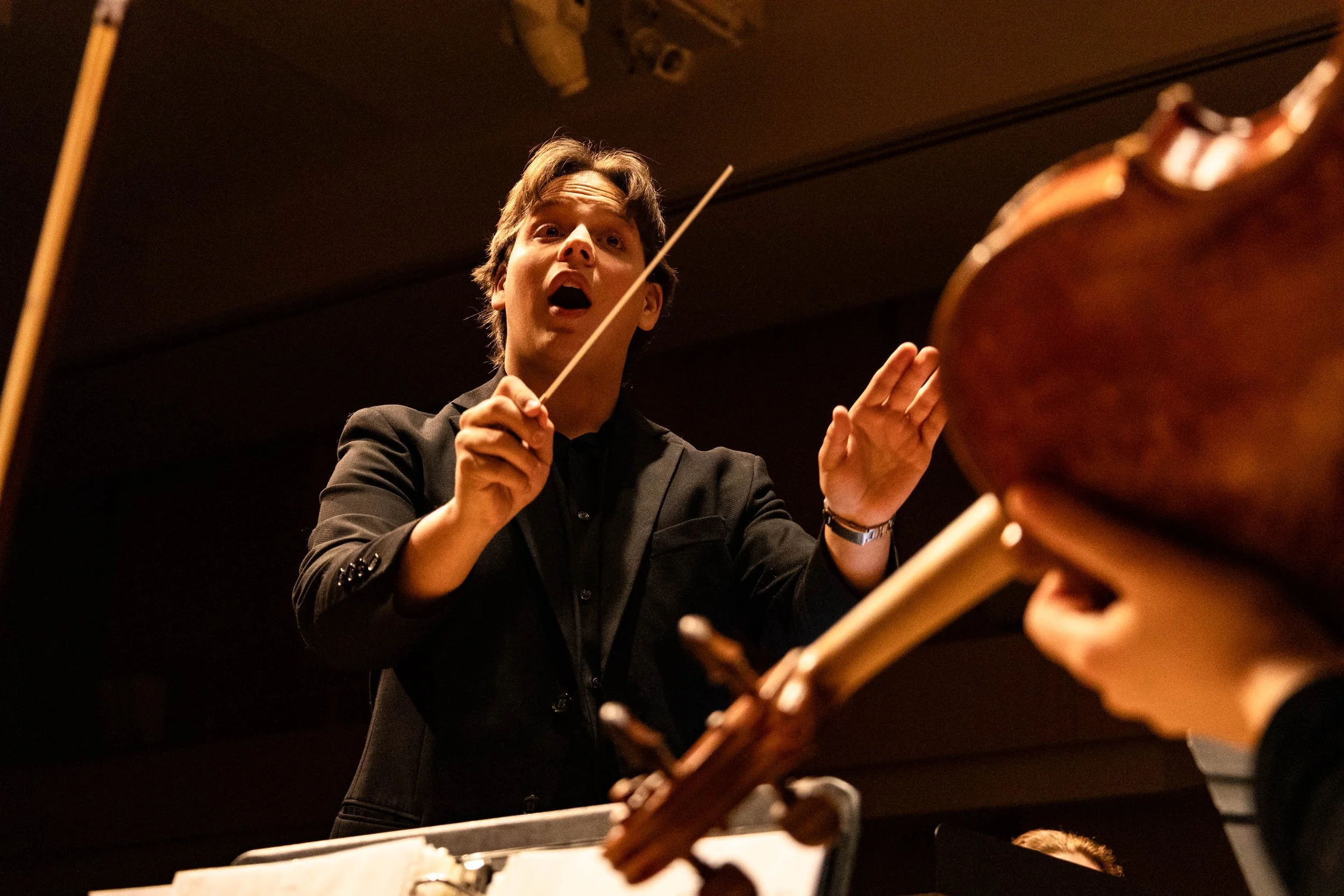 Dream Sequence no.4 -
Junior Music Composition major Collin Huffman conducts the ensemble as they rehearse Movement 3 of Variations on A Dream, a concerto written by Huffman and his fellow composition students Demetrius Robinson Jr. and Jilin Zhang. 