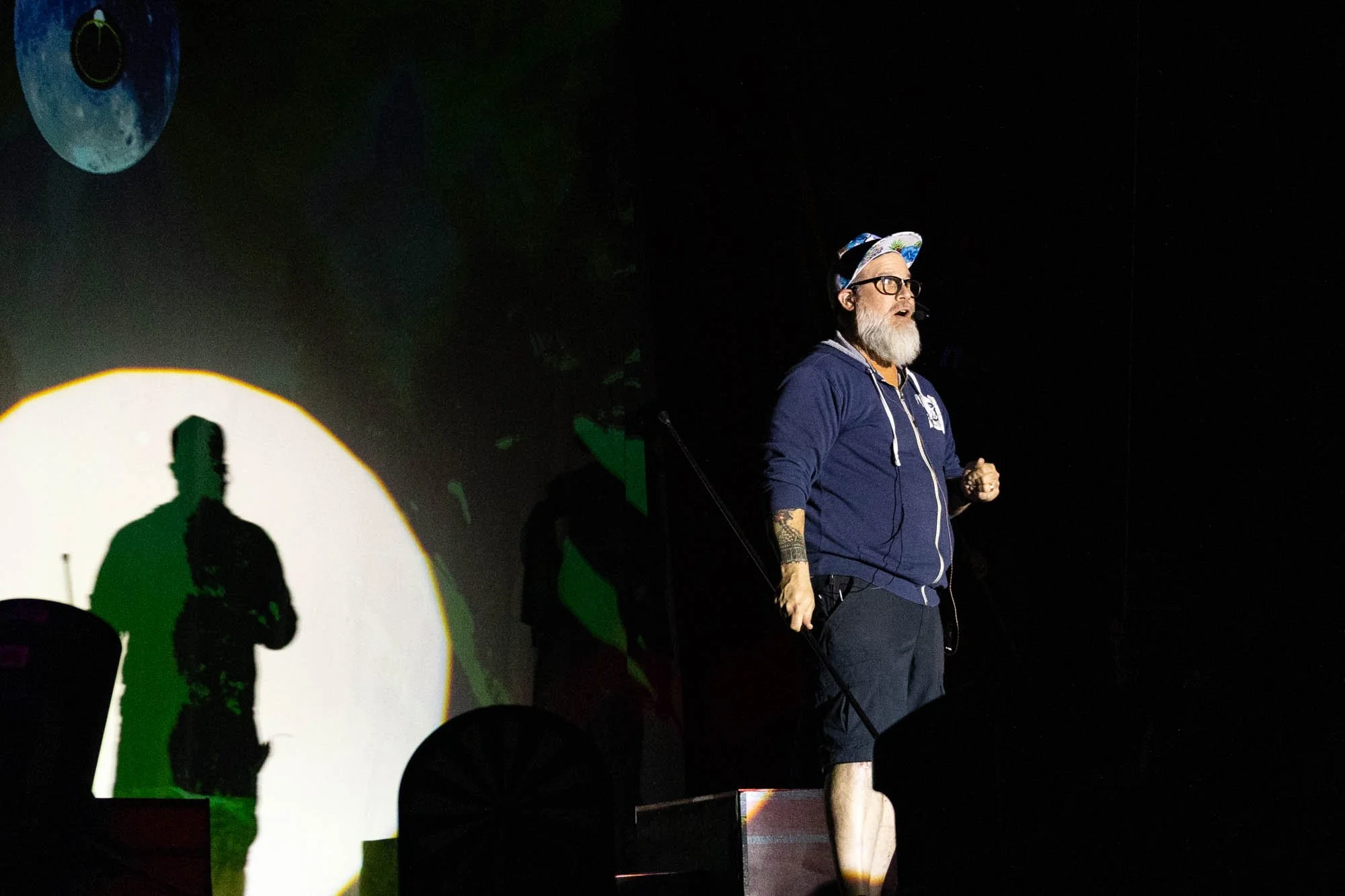Standing on stage at the top of the show, David Pierce gives his opening monologue as "The Ringmaster."