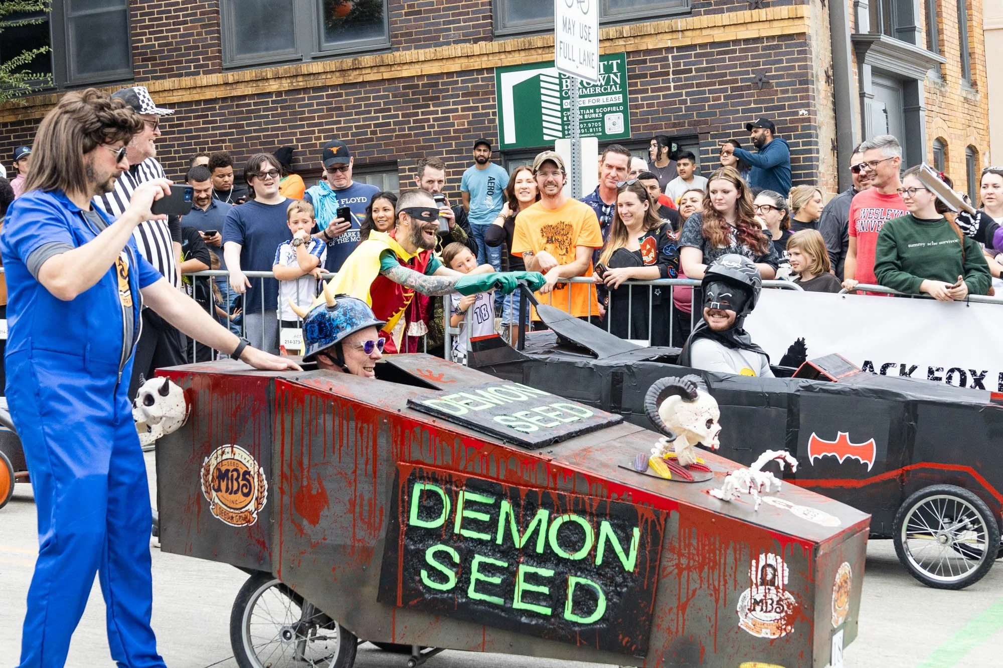 As the announcer begins stating the names of the teams, Toast and Gilley share a laugh with their opponents, MBS Seed Inc.