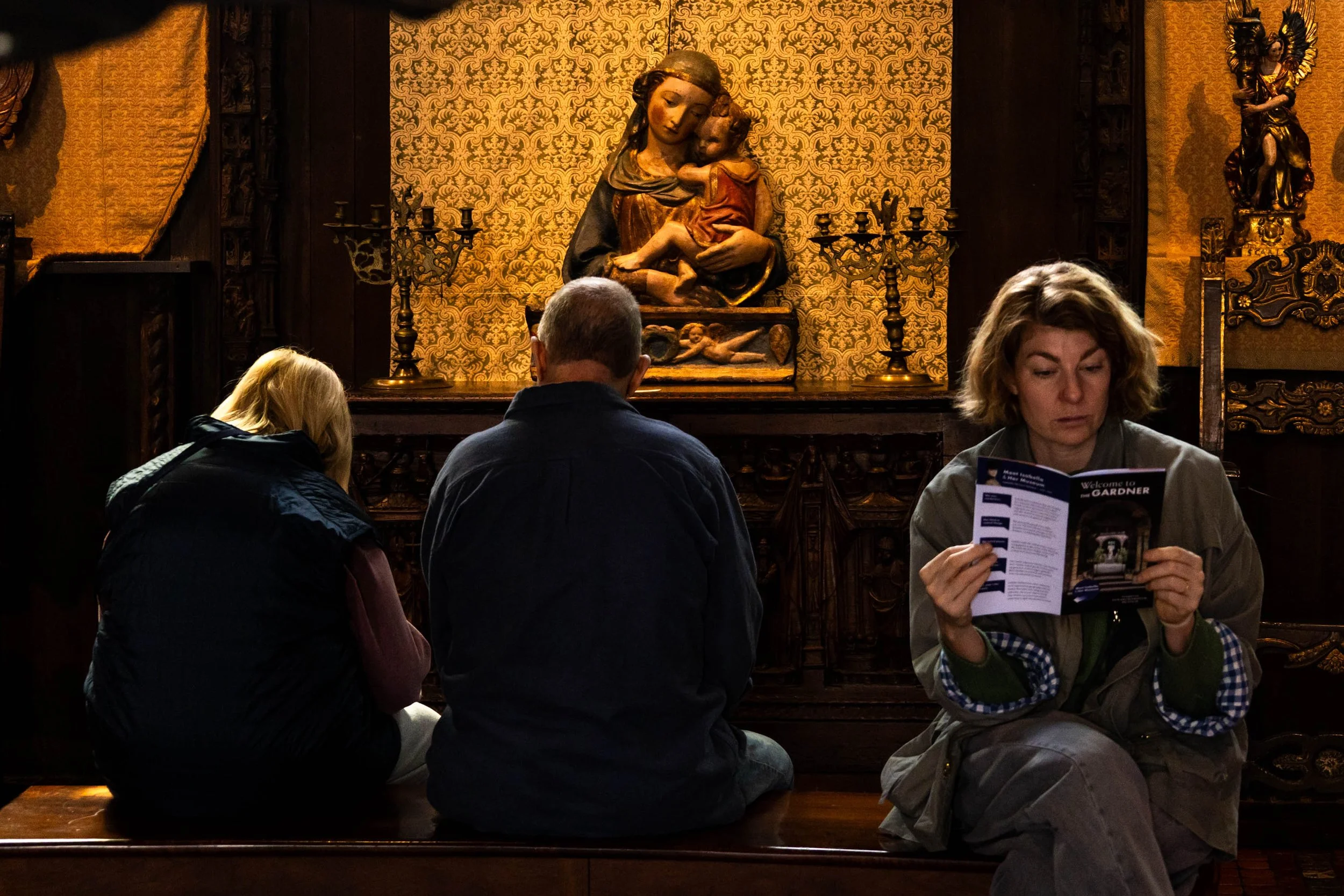 The Viewing Room  𖦹  In the 6th-floor Gothic room of the Isabella Stewart Gardner Museum, patrons sit on a viewing bench in front of Virgin and Child, an early 15th-century sculpture from Florence, Italy. The museum, located in Boston, Massachusetts