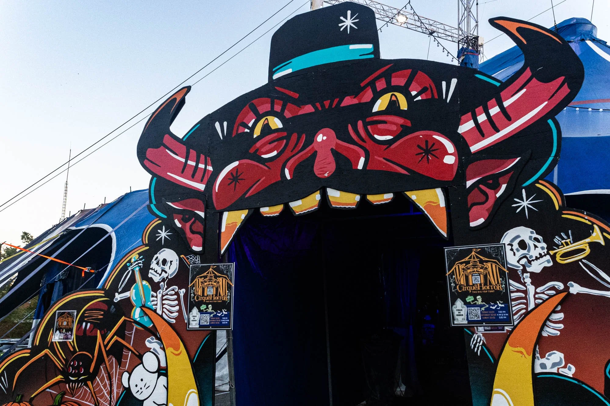 Outside the big top tent, the hand-painted wooden entrance to the Cirque du Horror show depicts the Ringmaster, David Pierce's character.