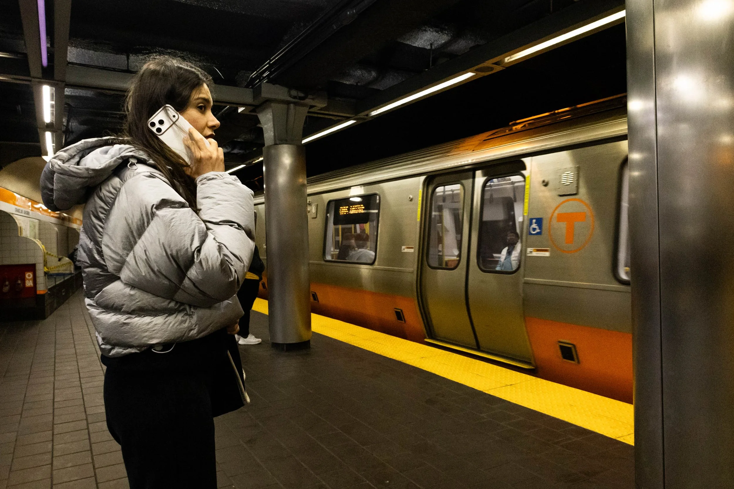 This is My Stop  𖦹  At the Chinatown station, the Northbound Orange Line train screeches to a stop. The Orange Line runs from 6 a.m. to 12:30 a.m. the next day.
