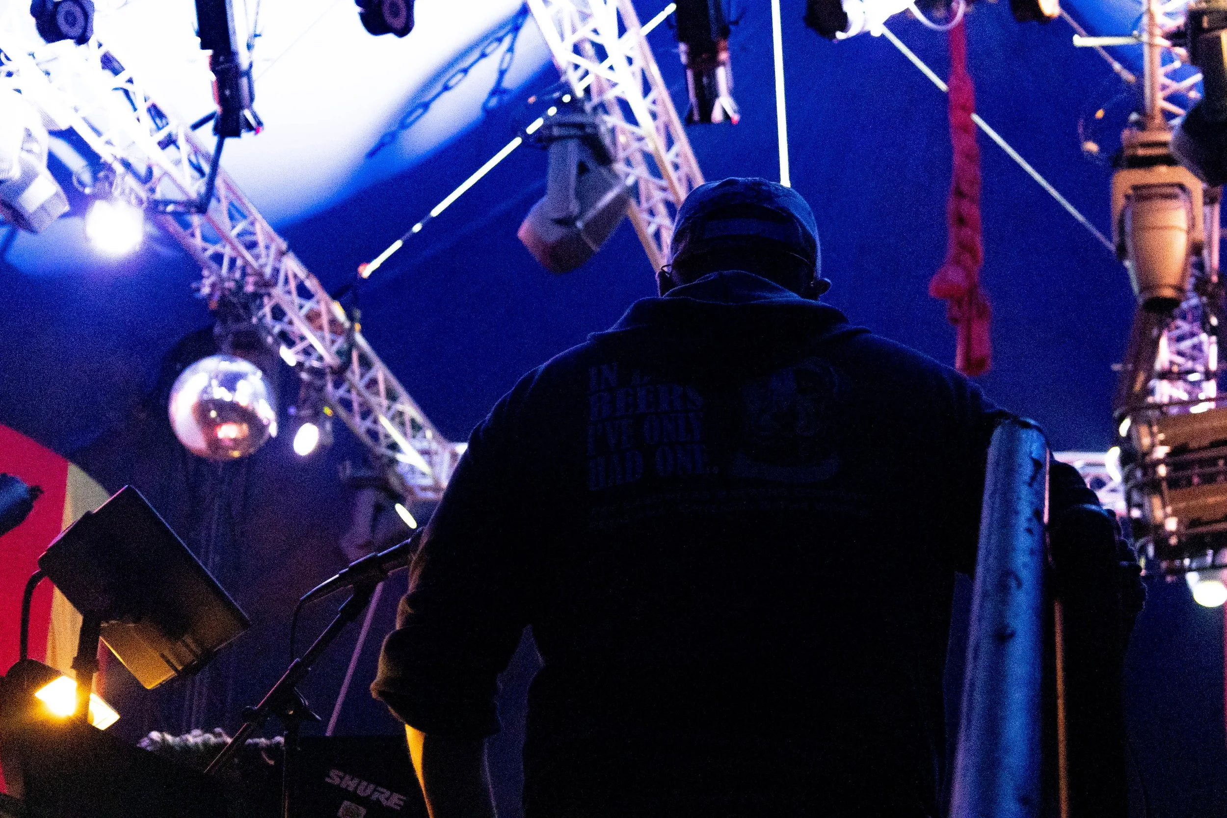 Rising the steps to the conductor booth, David Pierce prepares for rehearsal of Act 2 of the Cirque du Horror Halloween musical. He oversaw the setup of the big top tent the musical was held in. 