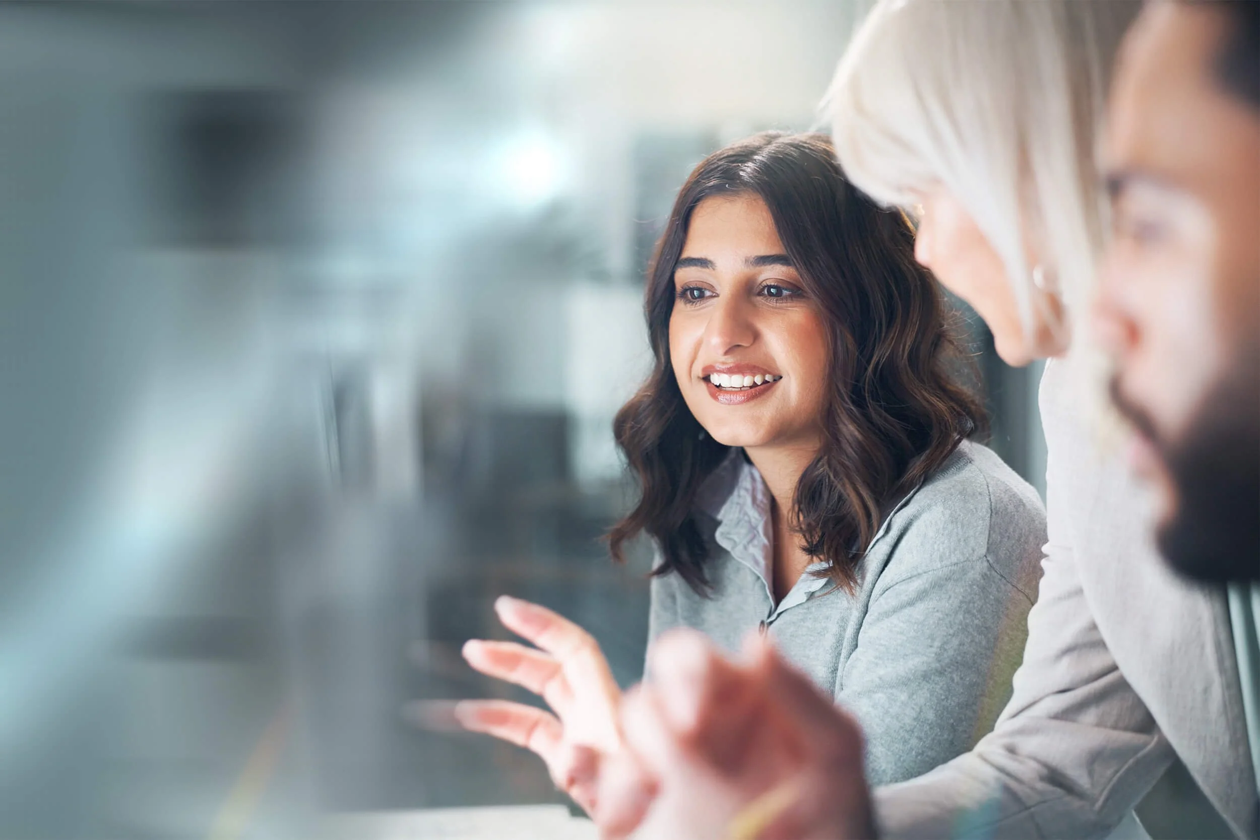 Women working together in an AI Validation studio meeting
