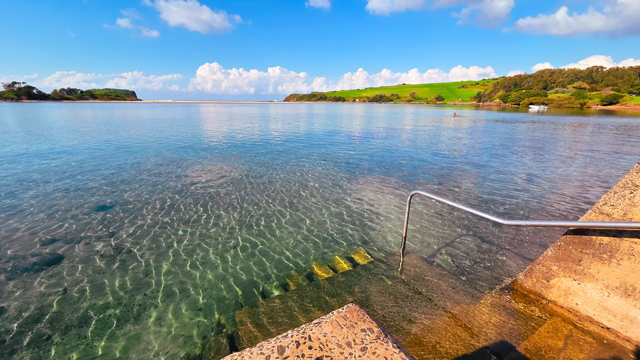 The steps down into Minnamurra lagoon. It's pretty shallow so great for everyone. Check the tide times and time your run for high tide for the best swim experience.